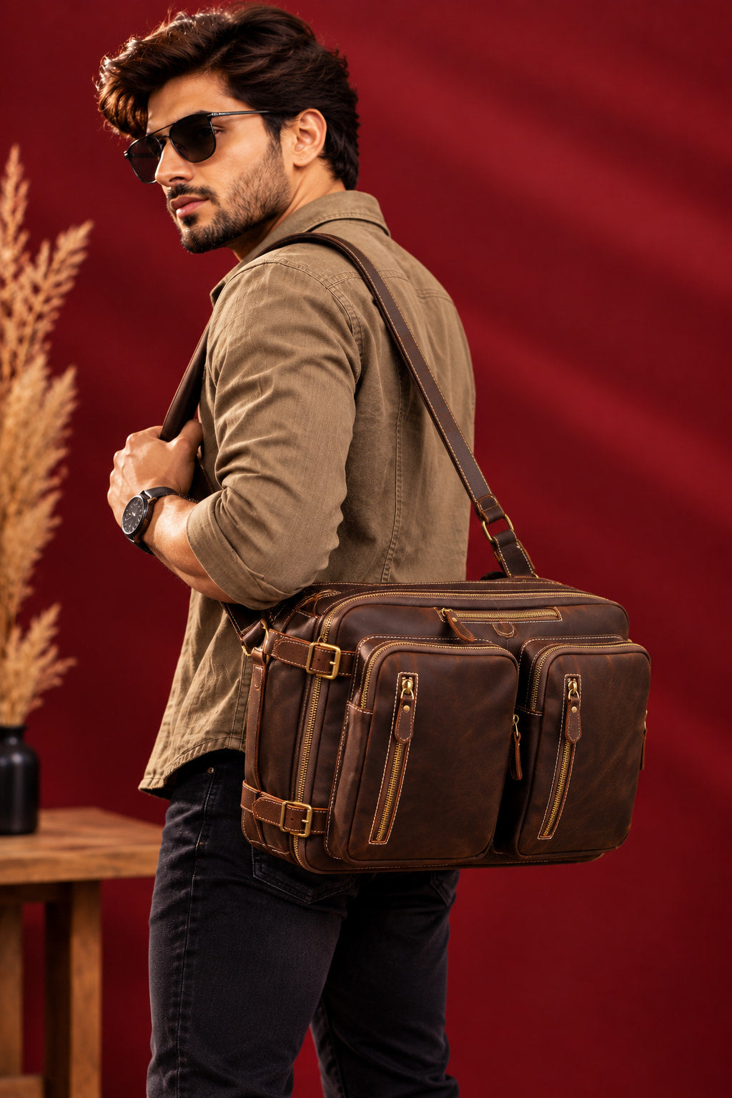 2-in-1 Convertible Leather Laptop Bag & Backpack in Espresso, carried over the shoulder