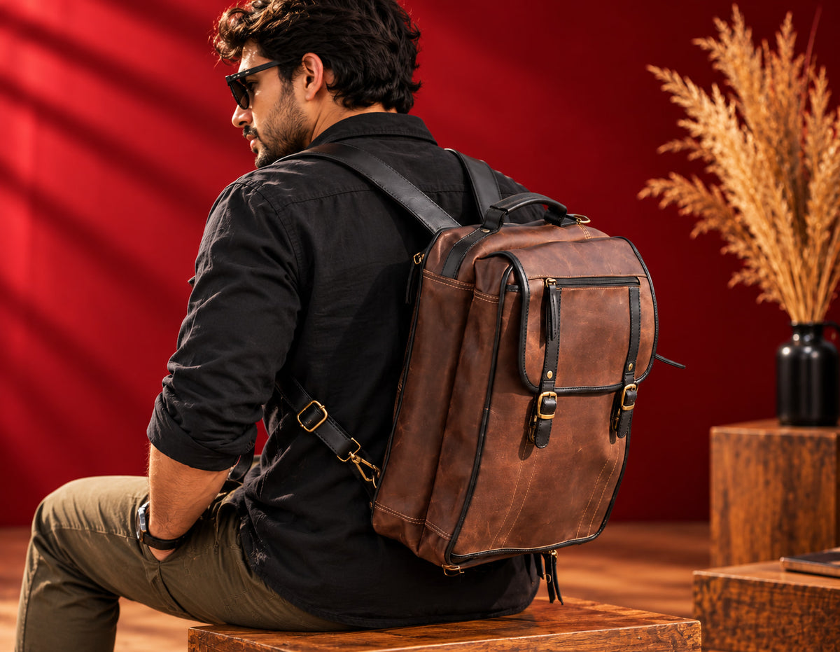 2-in-1 Convertible Leather Laptop Bag & Backpack in Saddle Brown, worn as a backpack