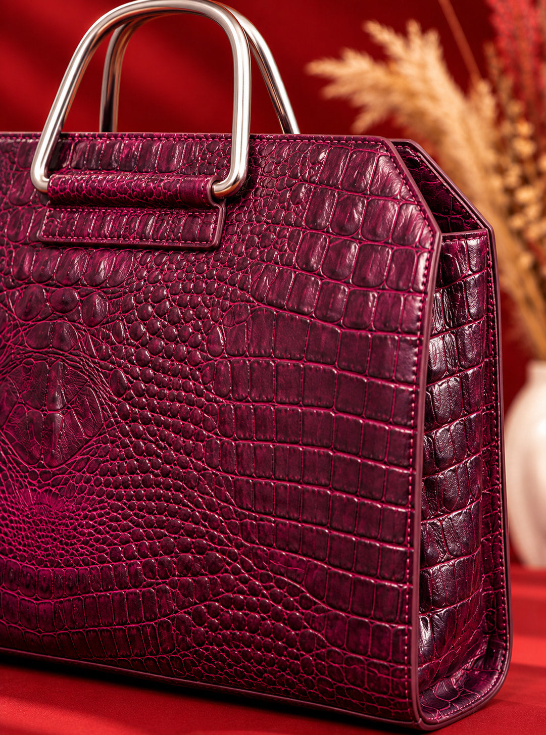 Croc Heritage Handbag in Burgundy Plum, texture and handle close-up